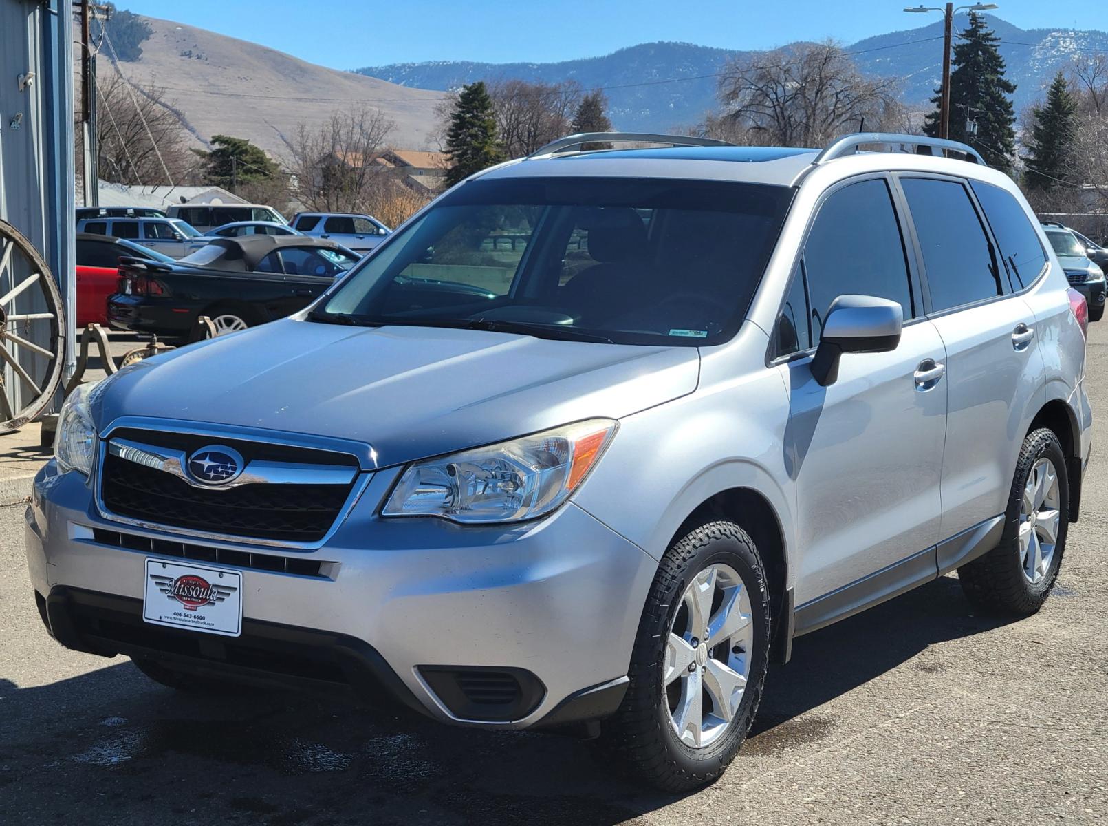 2015 Silver /Black Subaru Forester Premium (JF2SJADC3FH) with an 2.5L H4 engine, Automatic transmission, located at 450 N Russell, Missoula, MT, 59801, (406) 543-6600, 46.874496, -114.017433 - Photo #1